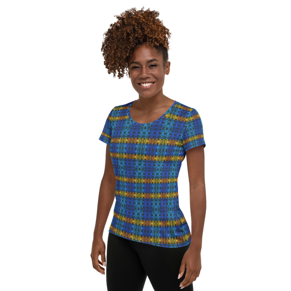 Woman in blue & gold athletic t-shirt featuring an abstract stripe pattern (side view)