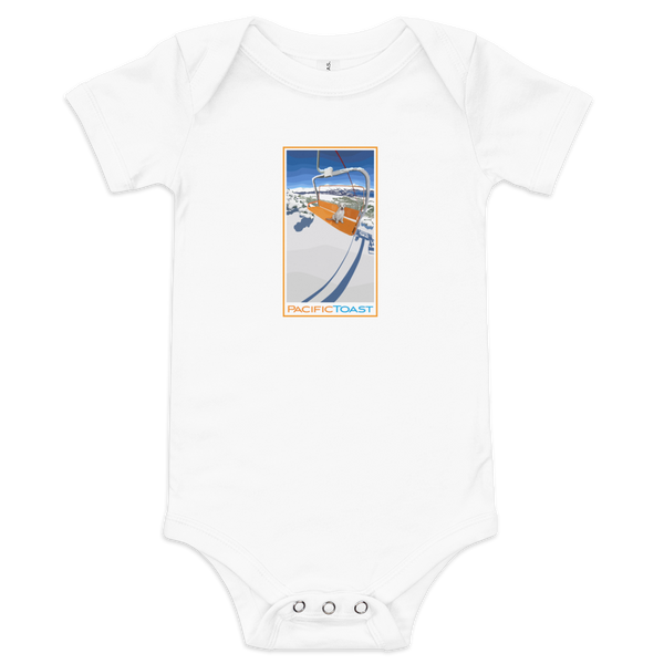 White short sleeve baby onesie featuring an illustration of a white lab puppy sitting in a ski chair lift