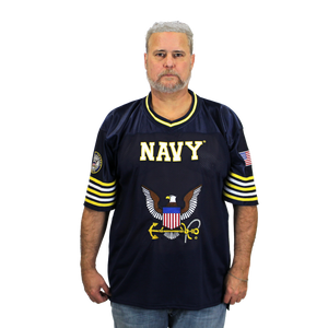 Model wearing U.S. Navy Football Jersey showcasing official design, athletic fit, and premium embroidered military graphics Model wearing U.S. Navy Football Jersey showcasing official design, athletic fit, and premium embroidered military graphics