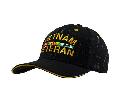 Right side view of Vietnam Veteran Patterned Print Cap highlighting bold embroidered Vietnam Veteran text, yellow accent brim, and patterned design.
