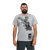 Human model wearing Made in the USA U.S. Army Eagle Flag T-Shirt featuring eagle and American flag graphic with Army logo.