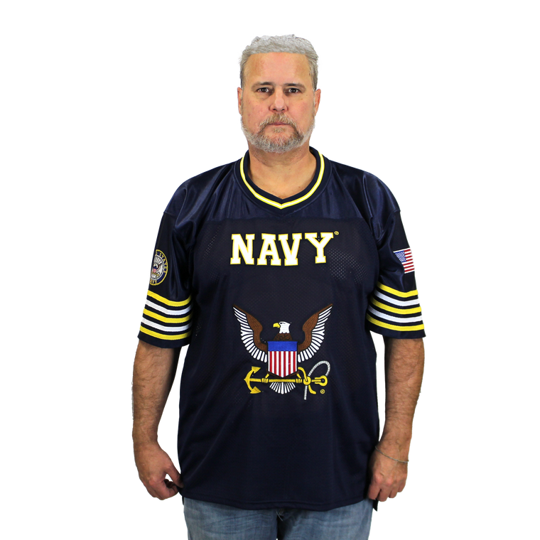 Model wearing U.S. Navy Football Jersey showcasing official design, athletic fit, and premium embroidered military graphics