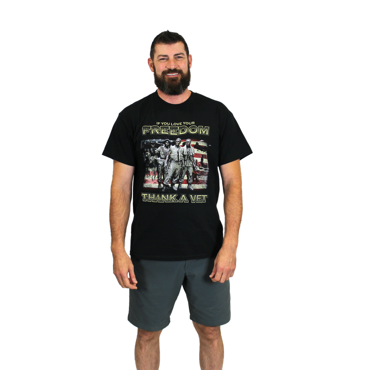 Front view of Thank a Vet Soldiers T-Shirt worn by model with patriotic soldier graphic.