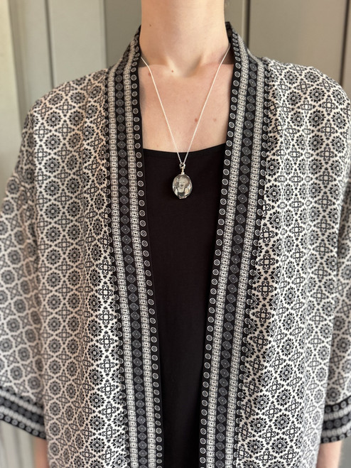 Sterling Silver Adjustable Rolo Chain featuring a 3/4” Oval Journey Locket Sterling Silver Adjustable Rolo Chain featuring a 3/4” Oval Journey Locket