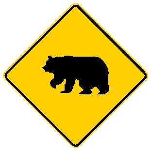 diamond shape, black and yellow sign, features a bear.