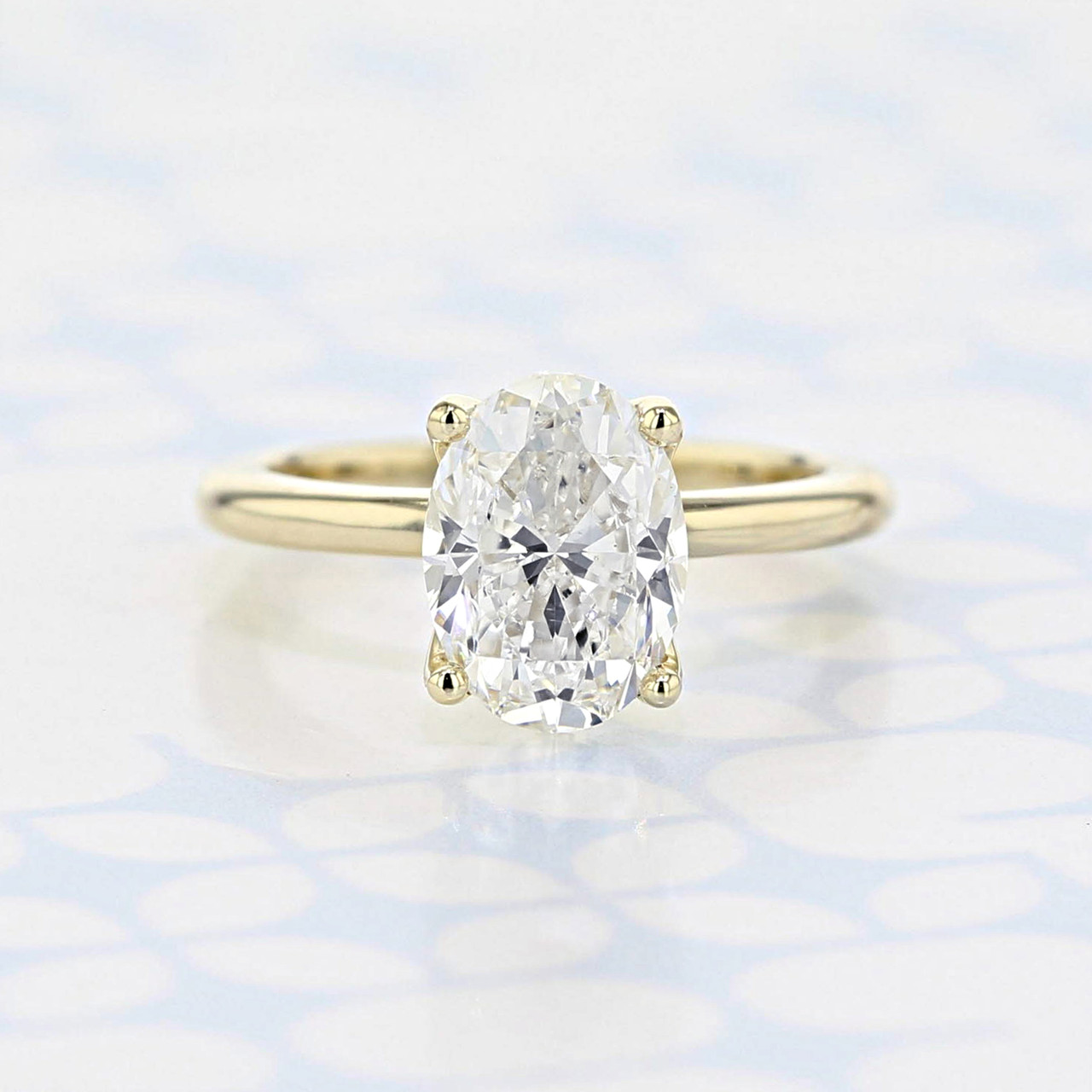 Oval Solitaire Diamond Ring — EMI GRANNIS