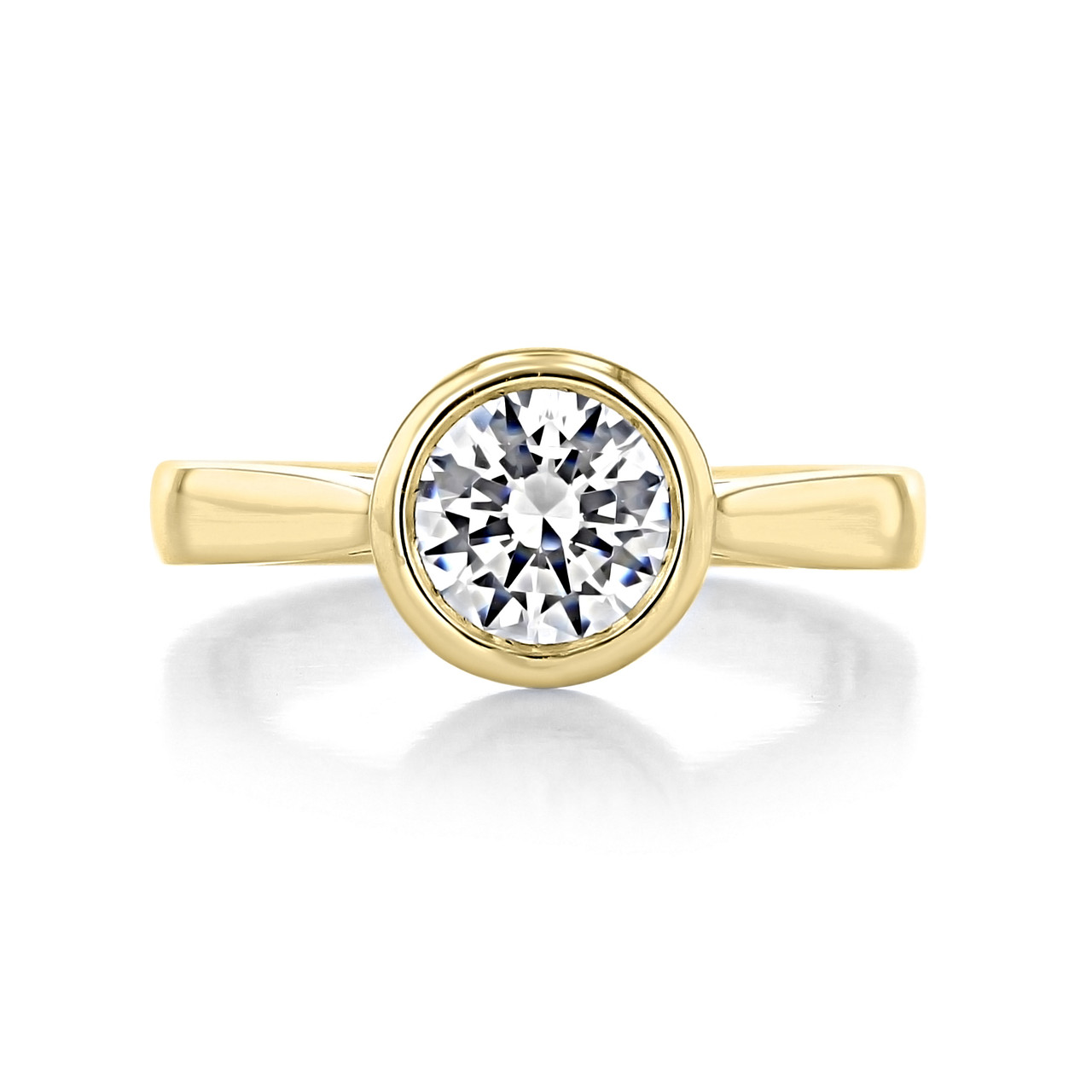 Diamond Essence Bezel set Ring with 1 Ct. Round Brilliant And Surrounding  Melee, 1.25 Cts. T.W. In 14K Solid Yellow Gold.