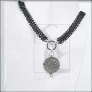 Franc sewn half moon necklace
