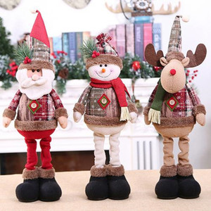 Three plush Christmas standing dolls