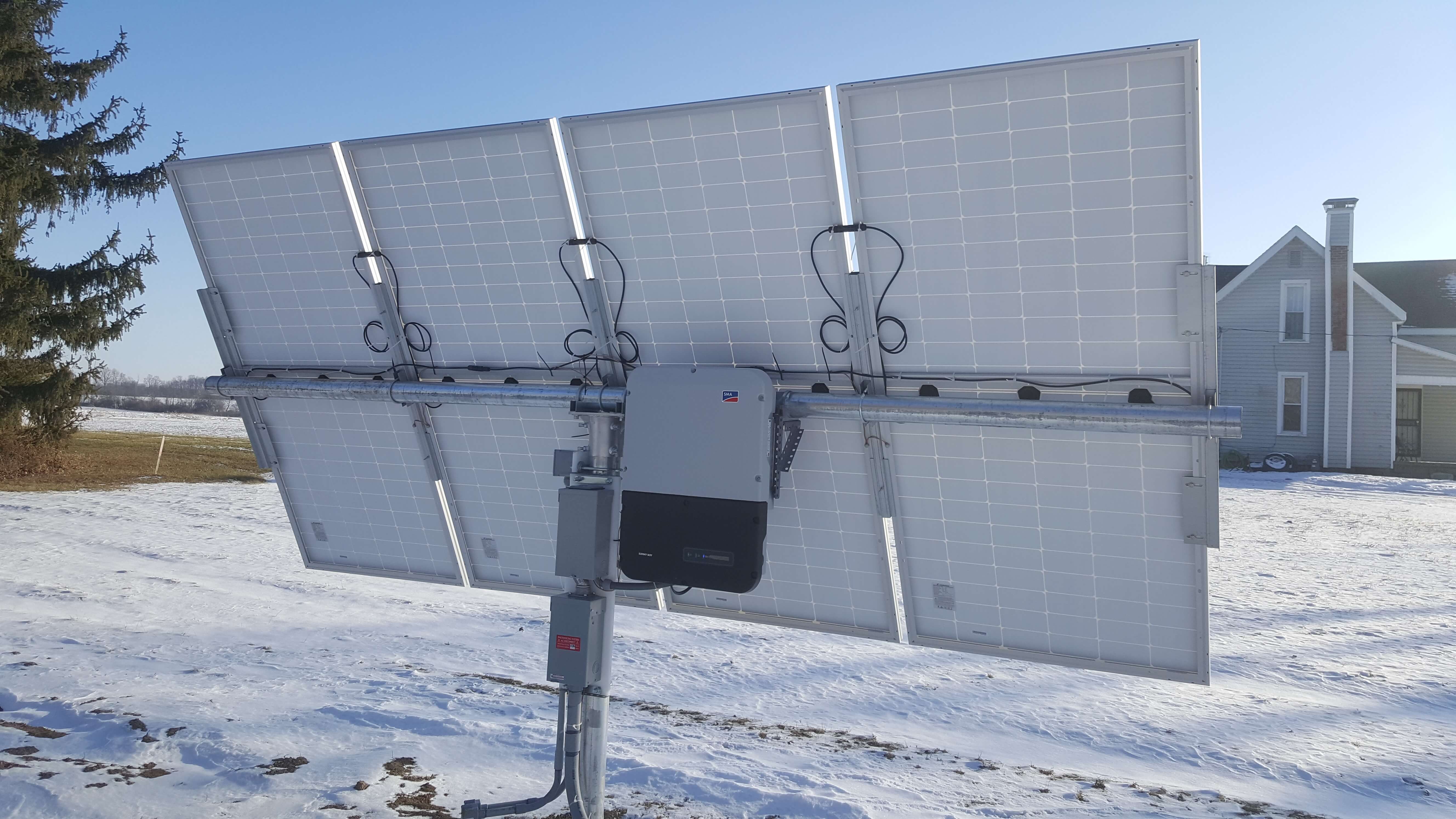 Ground-mounted solar pole system with inverter