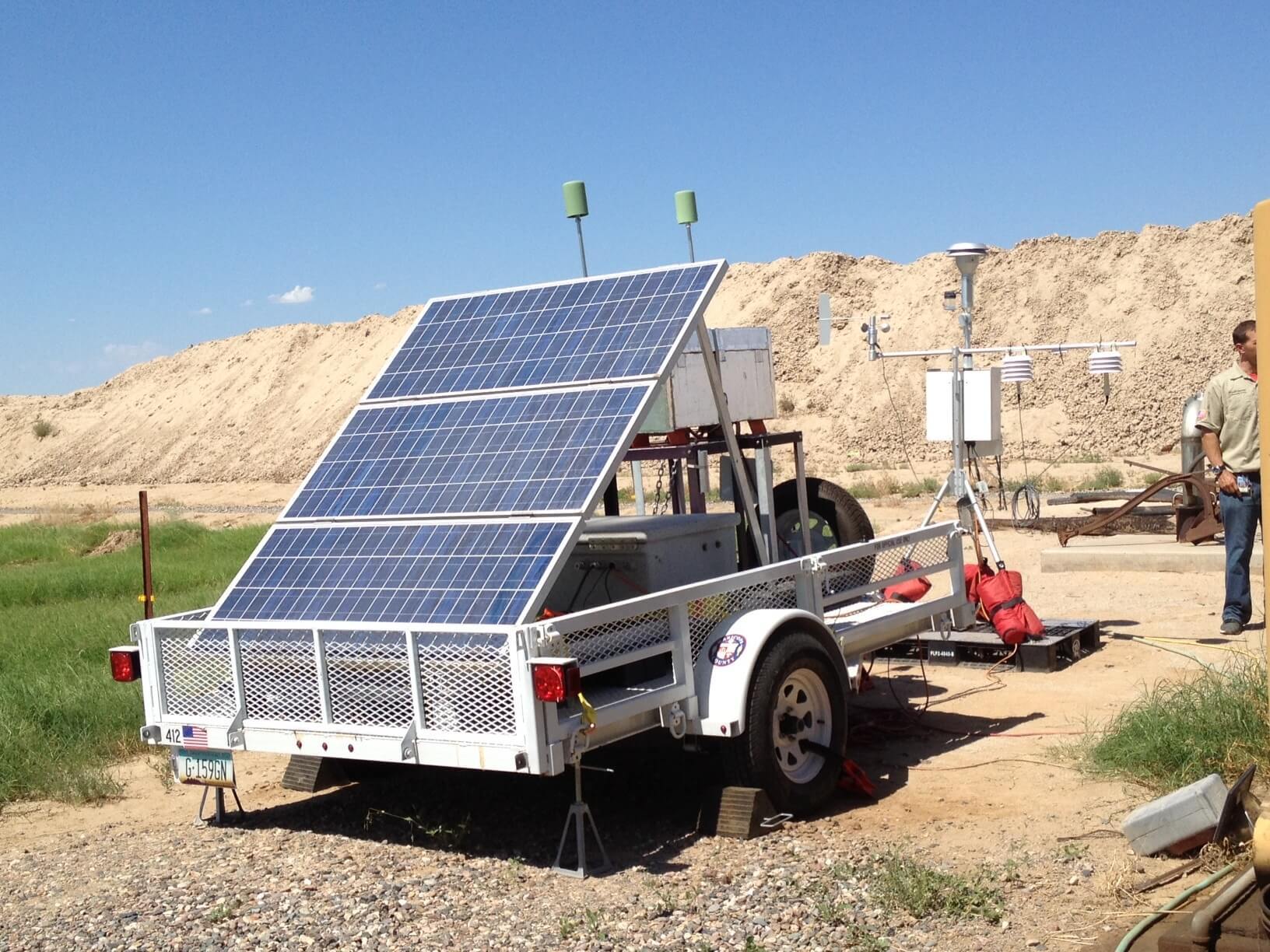 Portable solar trailer for off-grid applications