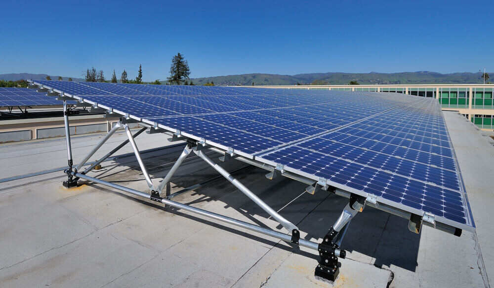 Commercial solar installation on flat roof with DPW racking