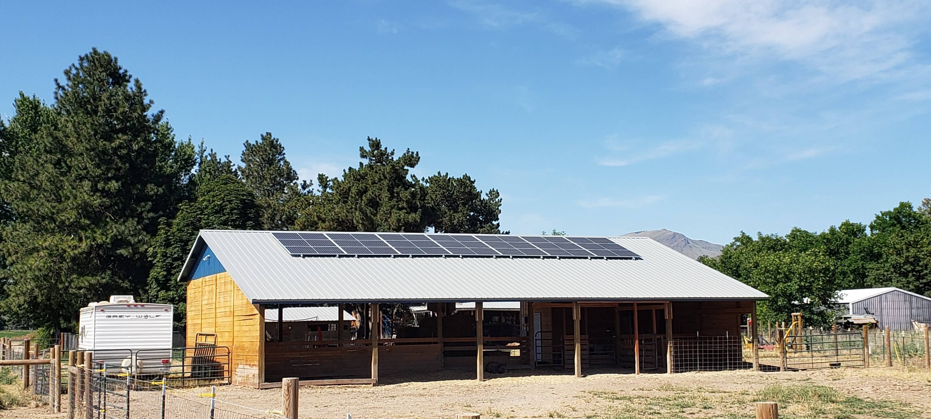 DIY solar array on barn with metal roof