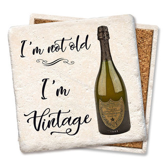 Coaster made of absorbent stone & cork back printed with I'm not old. I'm vintage saying