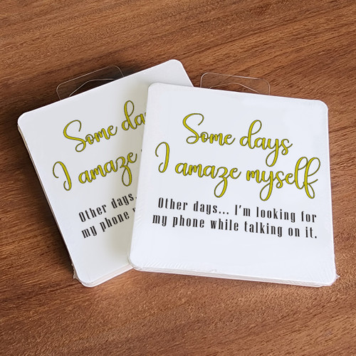 Paper coaster printed with Some Days I Amaze Myself Looking For Phone