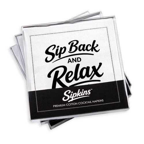 pack of 24 Sipkins™ premium cotton cocktail napkins in a clear box