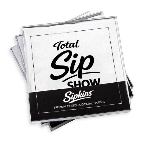 pack of 24 Sipkins™ premium cotton cocktail napkins in a clear box