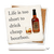 Ceramic coaster showing detail of Life is too short to drink cheap bourbon