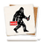 Ceramic coaster showing detail of bigfoot carrying a six pack of beer