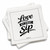 a slightly askew stack of Sipkins™ premium cotton cocktail napkins with Love at First Sip Sipkin™ on top