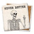 Coaster made of absorbent stone & cork back printed with a skeleton making a peace sign titled Never Better