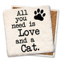 Coaster made of absorbent stone & cork back printed with all you need is love and a cat saying