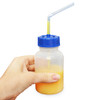 Squeeze the bottle to "help" fluid up the straw