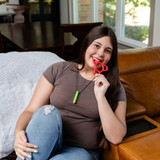 A teen chews the Red Bendy Bite, a thin chewable fidget great for front teeth and/or premolar chewing.