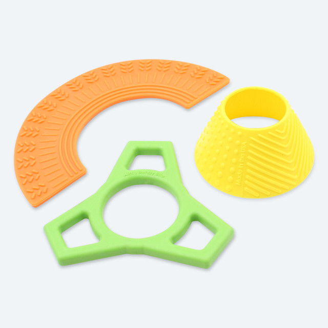 ARK Chewable Fidget Variety Pack - a bundle of three chewy fidgets, for both tactile fidgeters and chewers! Included is a rainbow shaped textured chew, a thin flippable cylindrical chew, and a tri-extension handheld chew that bends in on itself.
