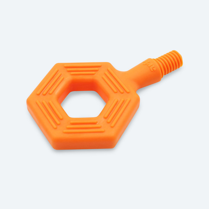 The ARK Hex Tip is a hexagonal shaped tip with a cut out center. It has lined texture along its wider, flat surface. The flat surface provides a good area to bite for feeding therapy or sensory exploration.