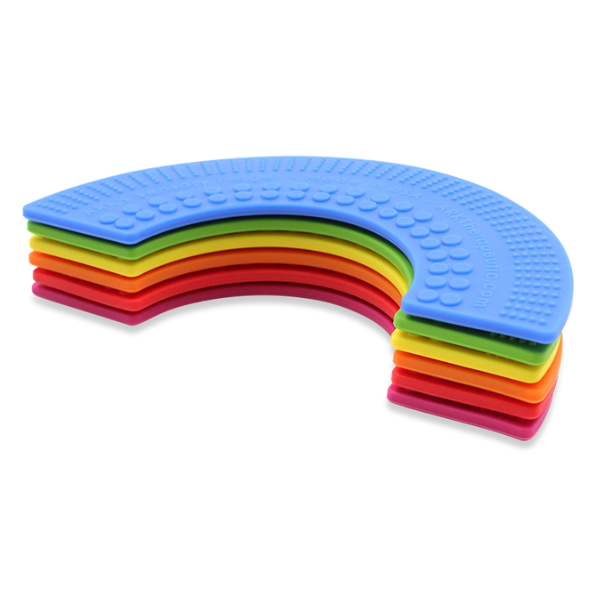 A stack of Chewable Rainbow Fidgets; a thin, flexible and heavily textured chewable fidget