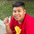 A teenager wears the translucent Krypto-Bite Gem Necklace: a versatile, prism-shaped, long and slender chew necklace that can reach the back molars