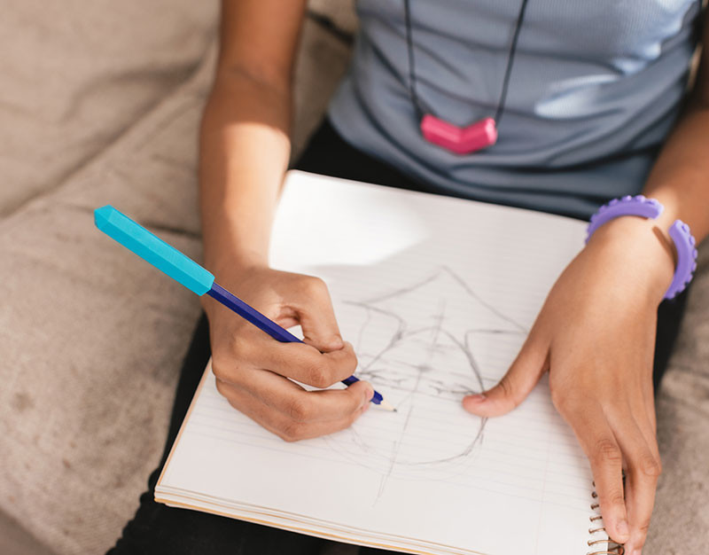 Why Kids and Adults Chew on Pencils and Pens