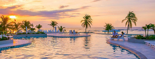 cayman-brac-beach-resort-pool-sunset.jpg