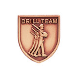 Antique bronze JROTC Drill Team medal showing three cadets marching in step carrying rifles at shoulder.