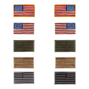 Variety of US flag patches in different color schemes including standard, monochrome, and camouflage for use on uniforms or apparel. Variety of US flag patches in different color schemes including standard, monochrome, and camouflage for use on uniforms or apparel.
