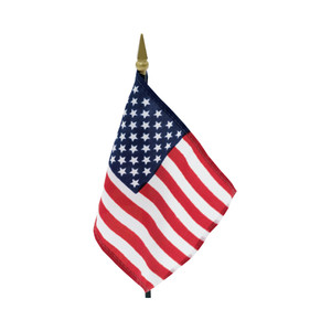 US spearpoint flag which is dyed in brilliant colors on polyester material and mounted on a black staff with a gilt spearhead.