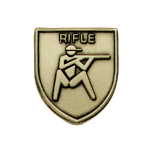 Gold shield-shaped JROTC Rifle medal with an embossed firearm and 'RIFLE' lettered at the top in relief.