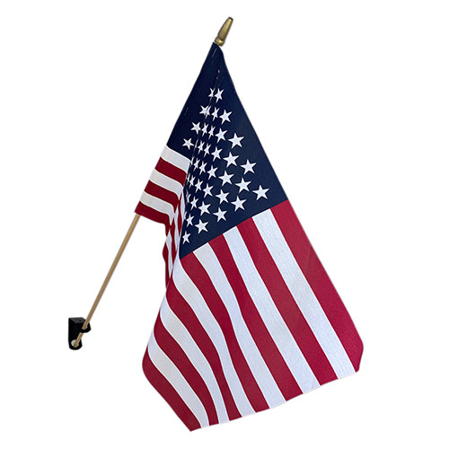 Classroom flag pole bracket with indoor American flag mounted for classroom display