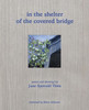 in the shelter of the covered bridge