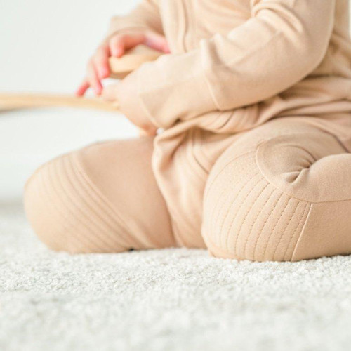 Wrap your little one in the cozy comfort of goumi kids Footies in Sand.