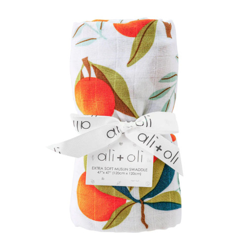 Crafted with care by Ali Oli, this orange swaddle is a must-have for new parents.