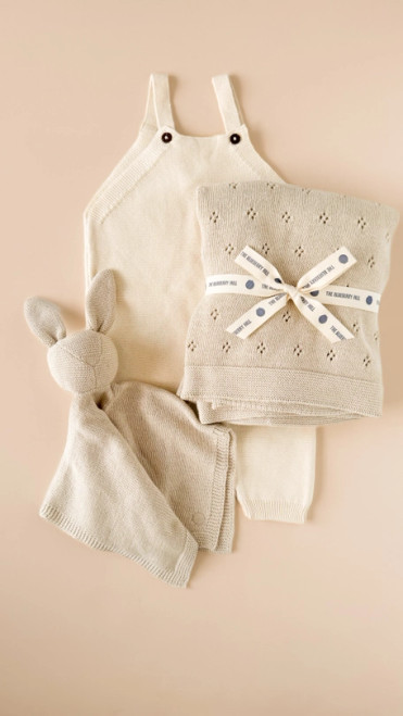 Introducing The Blueberry Hill Heirloom Pique Blanket in the sophisticated 'Birch' shade.