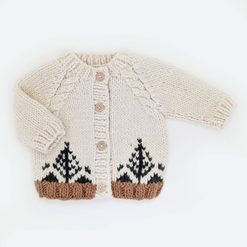 Embrace cozy elegance with the Huggalugs Forest Loden Cardigan Sweater. This beautiful piece is perfect for adding a touch of warmth and sophistication to any outfit.