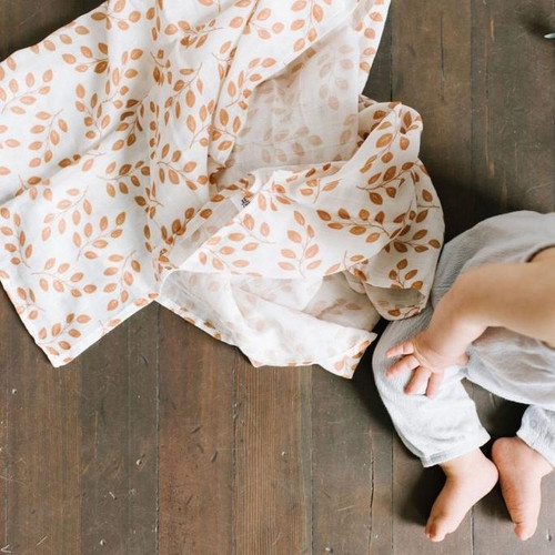 Introducing the Swaddle Leaves Amber from Mini Wander, a premium muslin cotton swaddle designed for your baby's comfort and security.