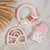 Ritzy Rattle with Teething Rings | Rainbow | Itzy Ritzy