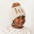 Explore the warmth and style offered by Huggalugs with this exceptional hat.