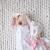 Introduce your little one to the comforting softness of the Lulujo Pink Bunny Lovey.