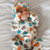 This charming pumpkin one piece is perfect for your little one's Halloween and Thanksgiving celebrations.