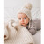 this Huggalugs blanket offers a substantial feel, providing a sense of security and well-being. Experience the cozy embrace of this exquisite cream knit blanket. Get yours today,